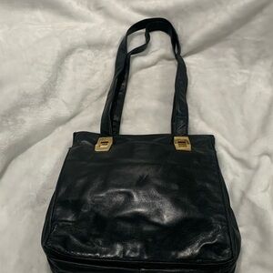Valerie Stevens Navy Blue Shoulder purse, lots of storage, snap closure